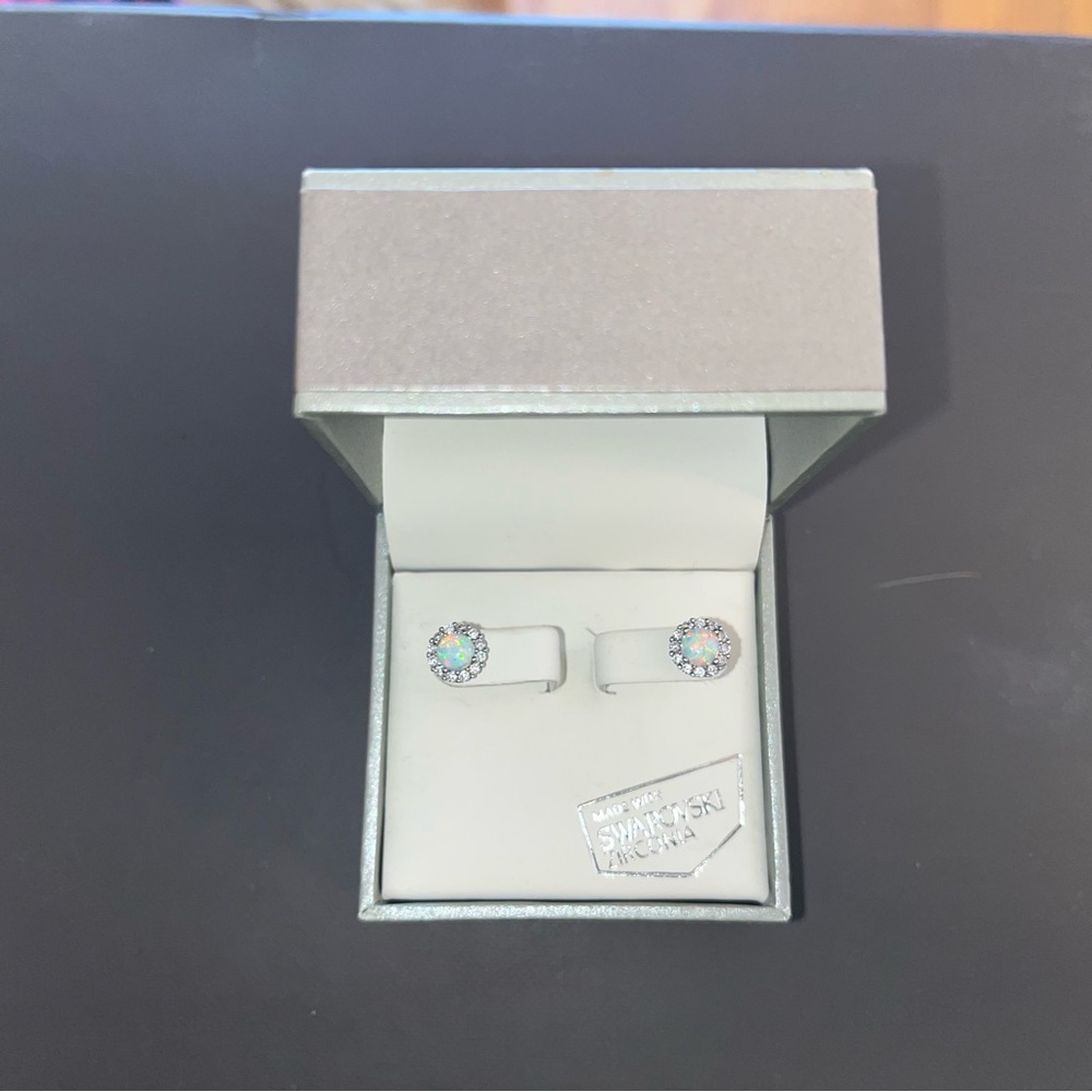 Kiera Couture lab created opal studs. Sterling silver. Swarovski Zirconia
